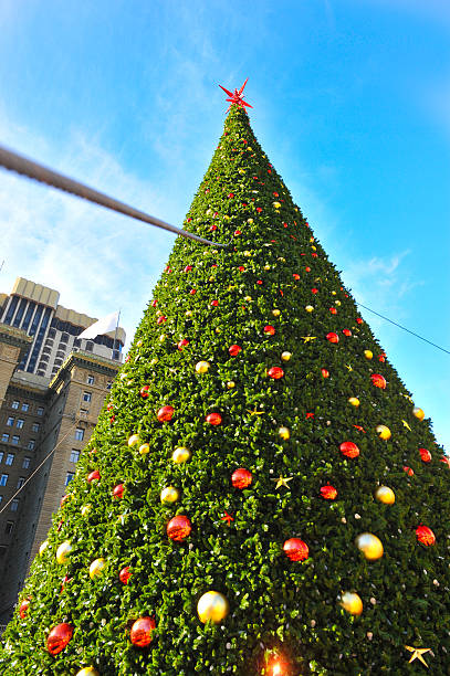 istock Huge christmas tree with cables and fence 453403801