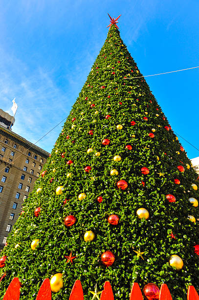 istock Huge christmas tree with cables and fence 453403837