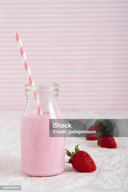 Strawberry Milk In Retro Bottle Vertical Stock Photo - Download Image Now - Bottle, Child, Crumpled