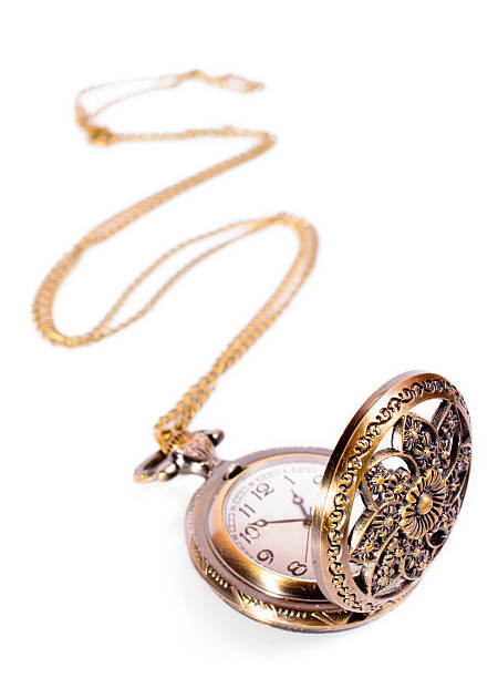 Vintage gold copper pocket watch isolated stock photo