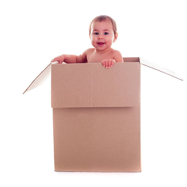 istock Baby and the box 453421603