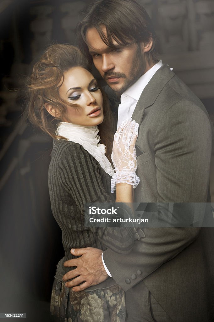 Young couple in an old house Adult Stock Photo