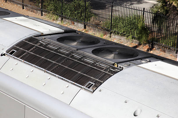 Train Detail A detail shot of a air-conditioner unit on a urban train train air conditioner stock pictures, royalty-free photos & images