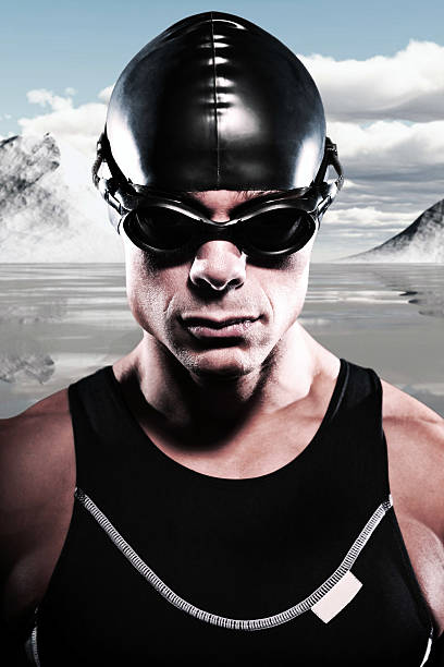 istock Triathlon swimmer man with cap and glasses outdoor. 453431053
