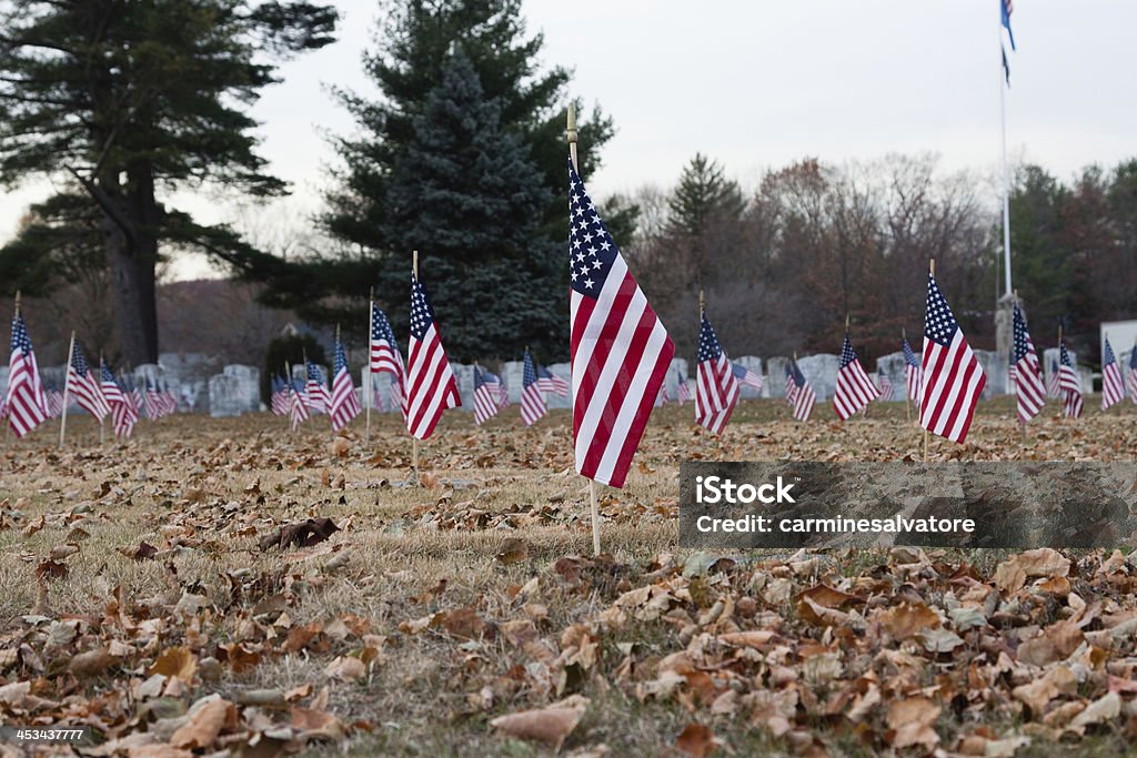 remembrance The "American Flag" at a tombstone of a Veteran American Flag Stock Photo