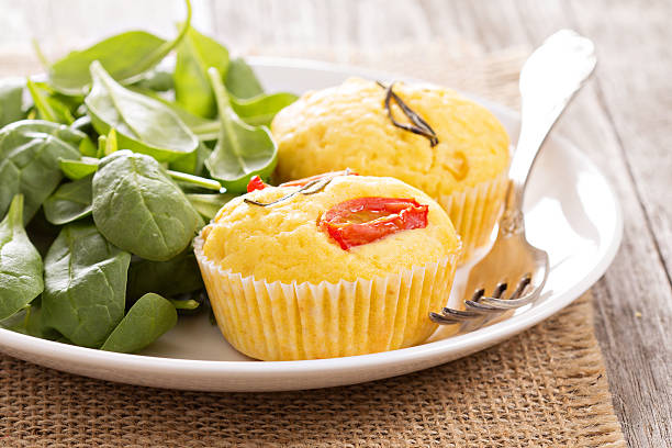 istock Savory muffins with corn flour, tomatoes and rosemary 453438307