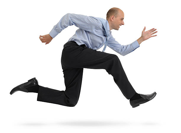 istock Businessman running isolated on white background 453442119