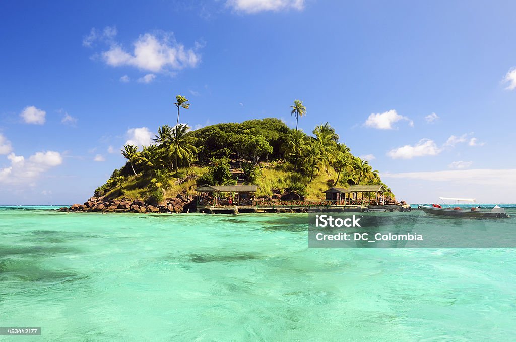 Secluded Tropical Island Lush tropical island surrounded by beautiful turquoise Caribbean water San Andrés Island - Colombia Stock Photo