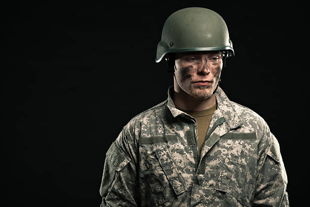 istock Military young man wearing helmet. 453448945