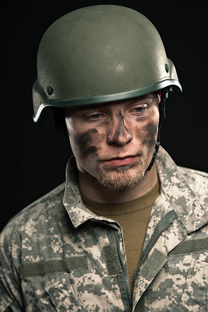 istock Military young man wearing helmet. 453448949