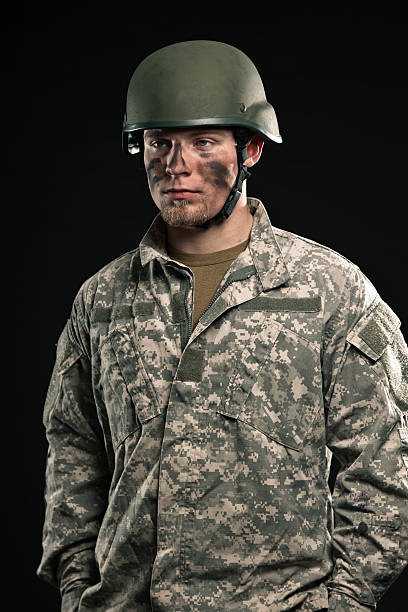 istock Military young man wearing helmet. 453448971