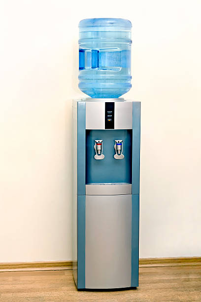 istock An electric water cooler in front of a white wall 453453835