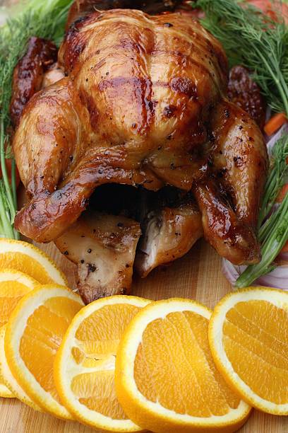 istock Whole roasted chicken with fresh vegetables 453457737