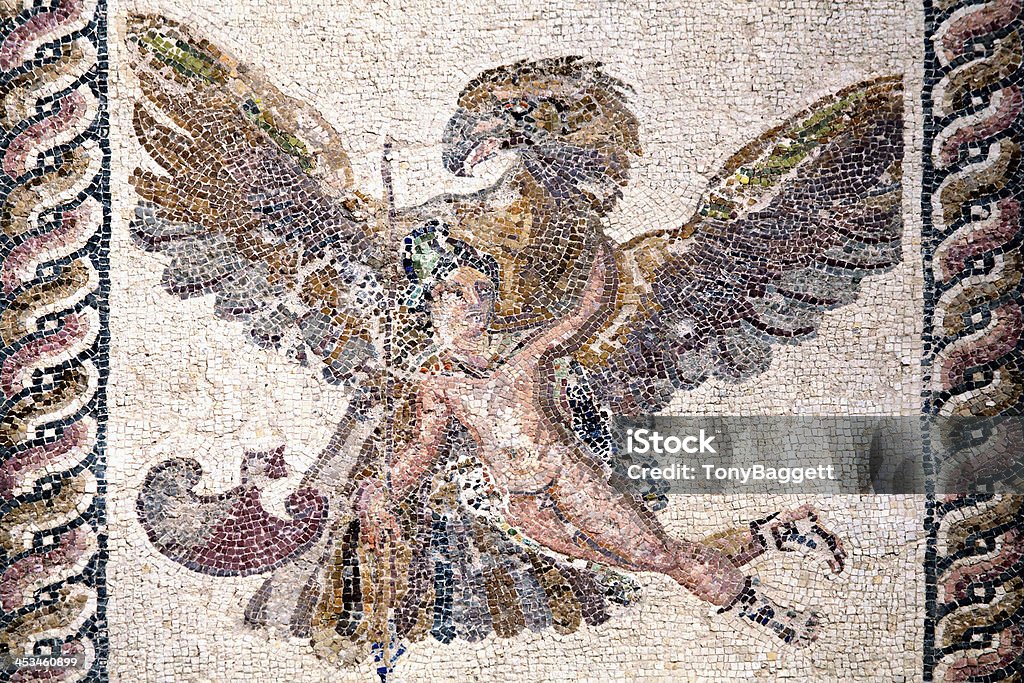 Ganymede And The Eagle, Roman Mosaic Roman mosaic of Ganymede and the Eagle from the ancient ruin of the House of Dionysos, Paphos, Cyprus Mosaic Stock Photo