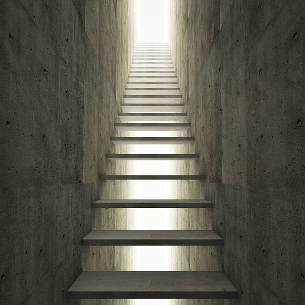 istock Abstract concrete stairway to the light 453467489