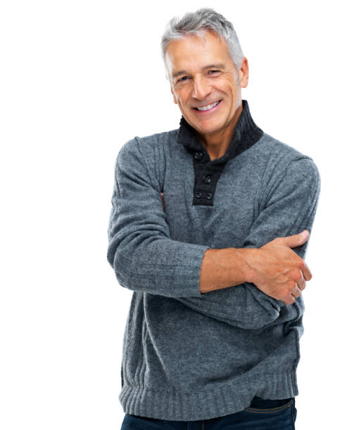 istock Happy mature man standing with folded hands 453468615