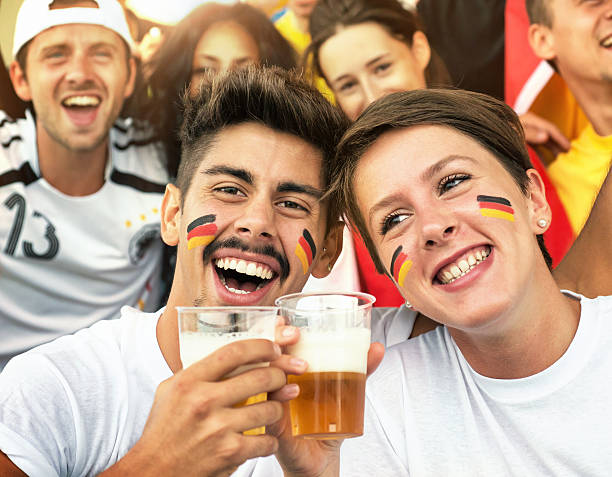 German Fans at the Stadium with Beer  football2014 stock pictures, royalty-free photos & images