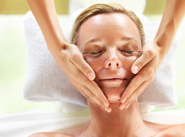 istock Face massage during a facial at a beauty spa 453469747