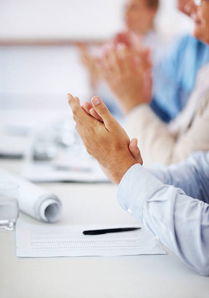 istock Business people clapping hands during meeting 453471373