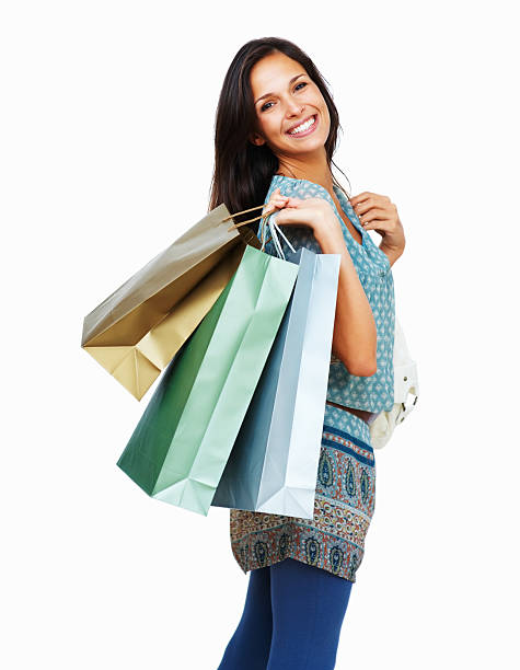 istock Smiling brunette holding shopping bags 453471575