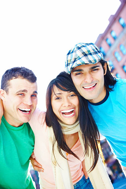 istock Dental - Happy young friends laughing 453473625