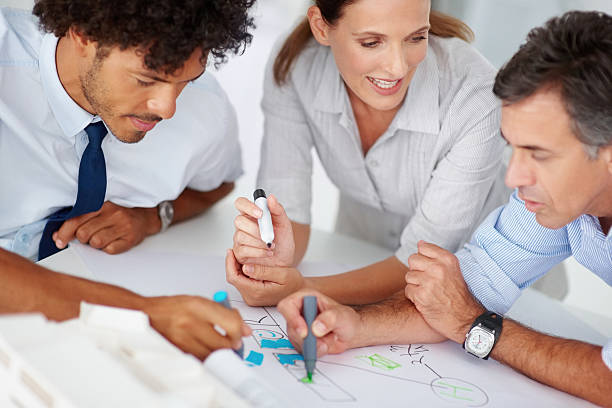 istock Group of magazine editors working together 453476797
