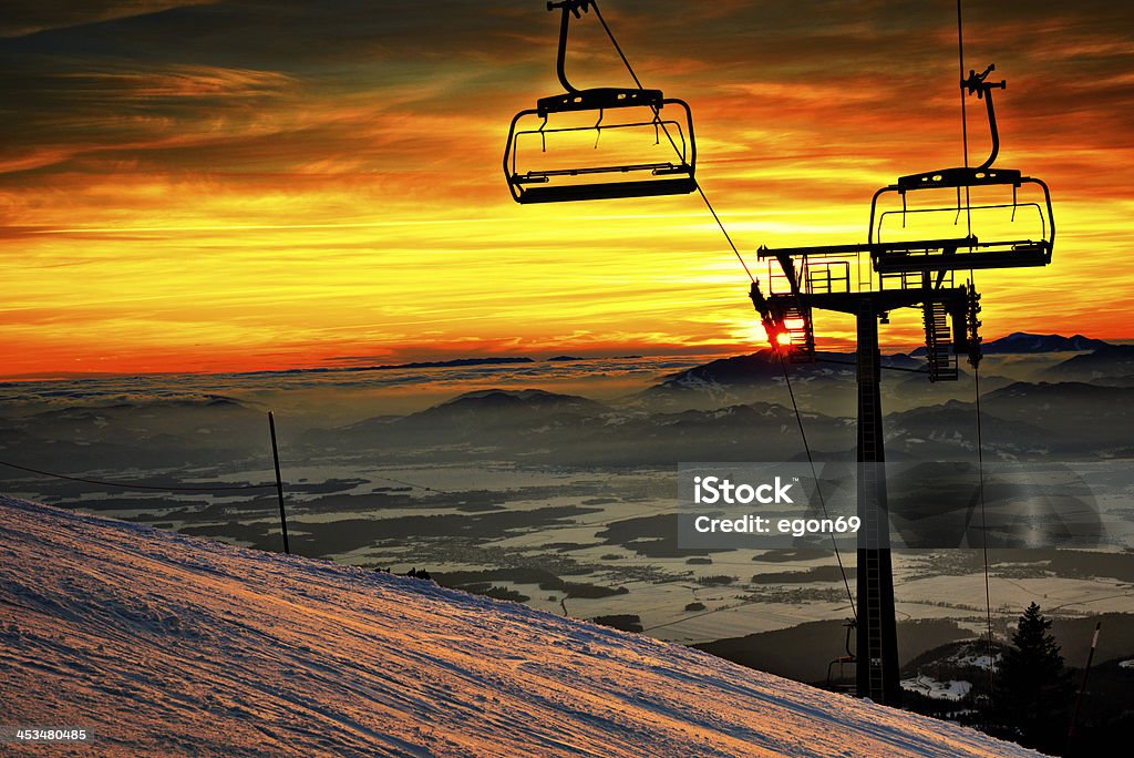 Chair Lift Chair Lift at sunset.Krvavec,Slovenija;Europe Cold Temperature Stock Photo