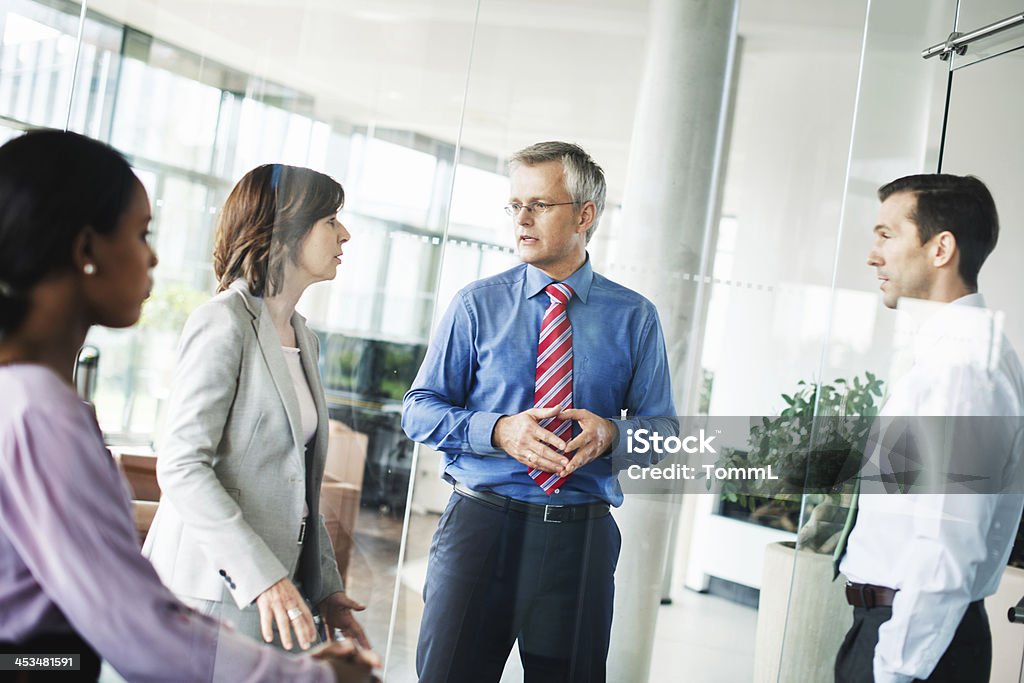 Equipe de negócios em discussão no escritório moderno espaço - Royalty-free Adulto Foto de stock
