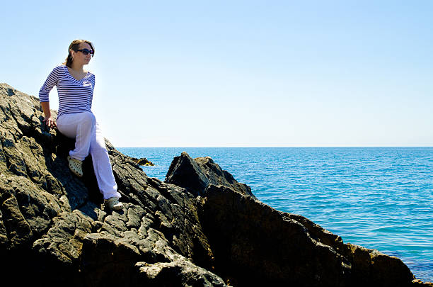 istock woman at the sea 453488923