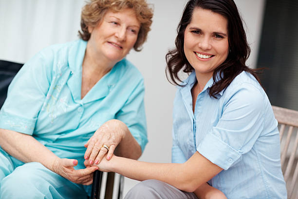 istock Young woman sitting with her mother 453490983