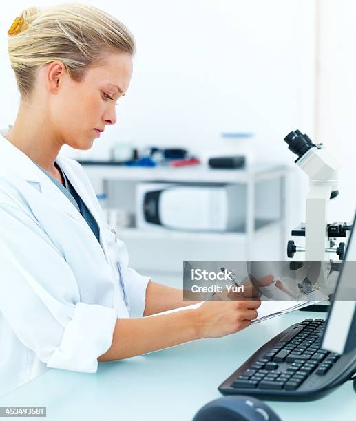 Young Researcher By Microscope Using Computer Stock Photo - Download ...