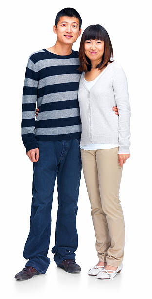 istock Young asian couple standing besides each other 453494247