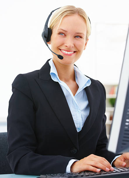 istock business woman working on a computer at office on white 453494457
