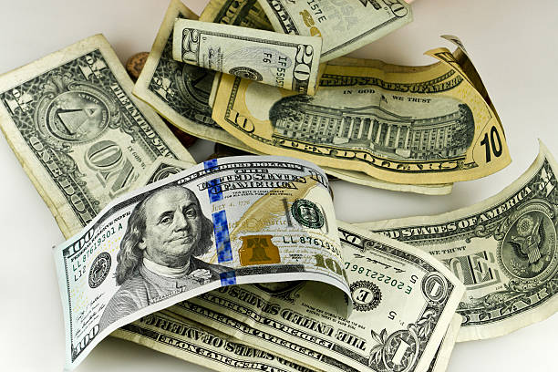 istock Different money denomination with new $100 dollar bill 453499335