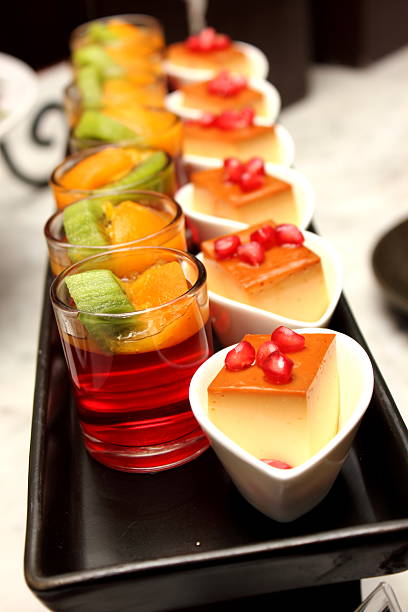 istock fruit jelly with caramel custard on black Plate 453501689