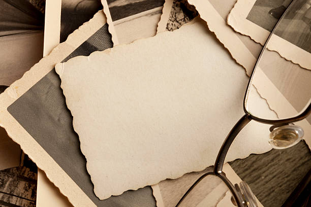 istock Old photographs with glasses 453508085
