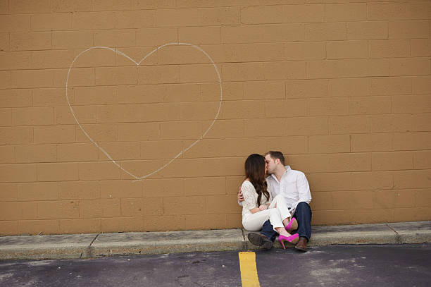 Young Couple Kissing Outside