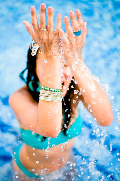 istock Water Dropping on Woman 453512081