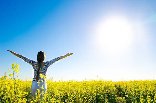 istock woman in the field 453515801
