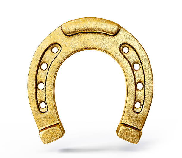 ferro di cavallo - horseshoe gold good luck charm symbol foto e immagini stock