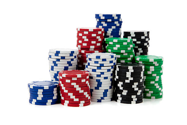 Stacks of poker chips on white stock photo