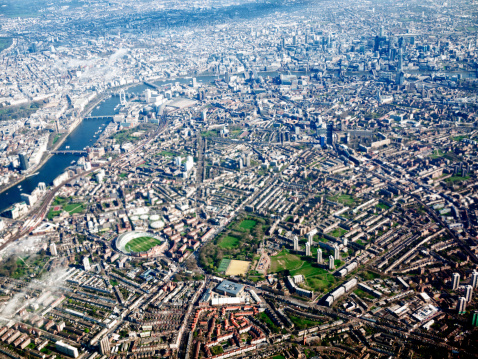 An aerial view of London and the River Thames, taken from within an aeroplane