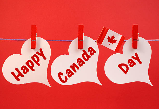 Happy Canada Day message hanging from pegs on a line