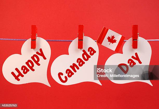 Happy Canada Day Message Hanging From Pegs On A Line Stock Photo - Download Image Now