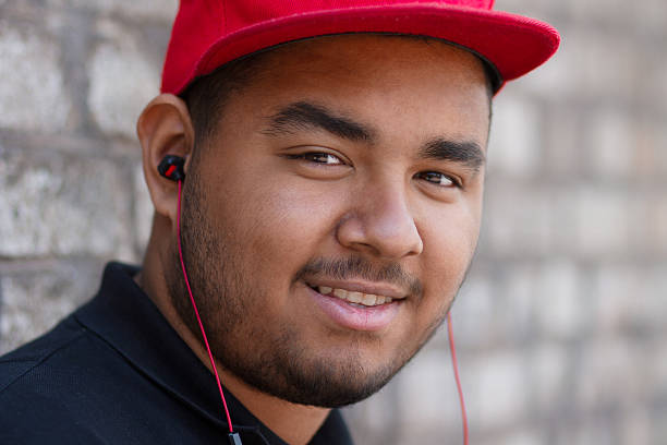 istock Black guy in headphones on the corner 453526221
