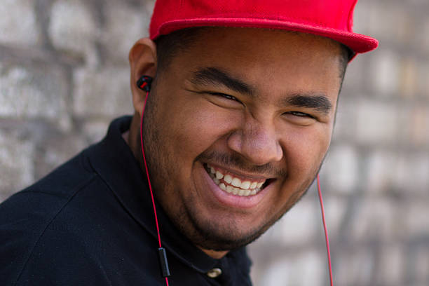 istock Black guy in headphones on the corner 453526247