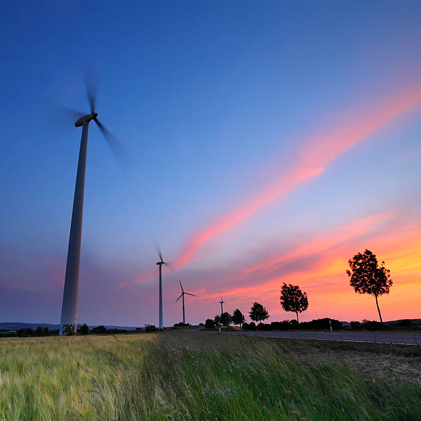 istock Windmill farm at sunse, Germany 453531001