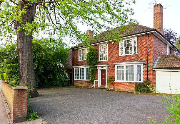 English brick house Traditional brick house in England brick house stock pictures, royalty-free photos & images