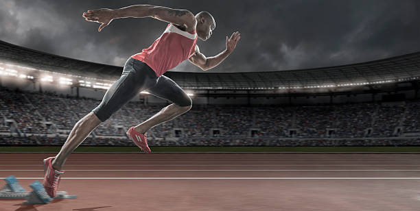 istock Sprinter in Mid Flow Bursting Out Of Starting Blocks 453541661