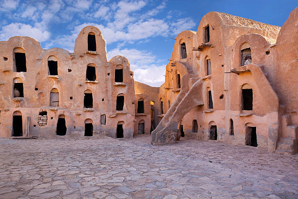 Ksar Ouled Soltane, Tataouine district in southern Tunisia Ksar Ouled Soltane is a fortified granary, or ksar, located in the Tataouine district in southern Tunisia. The ksar is spread out over two courtyards, each of which has a perimeter of multi-story vaulted granary cellars, or ghorfas. Like other ksour (plural of ksar) created by North African Berber communities, Ksar Ouled Soltane is located on a hilltop, to help protect it from raiding parties in previous centuries. ksar stock pictures, royalty-free photos & images